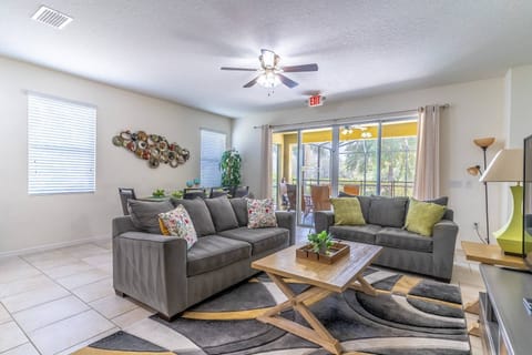 Bright and open living area with access to the private pool