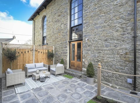 Garden with paving slabs and outside furniture