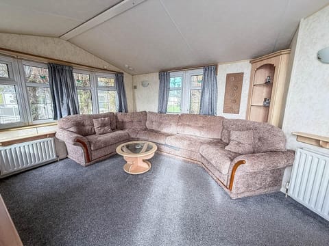 Cozy living room with plush seating and natural light