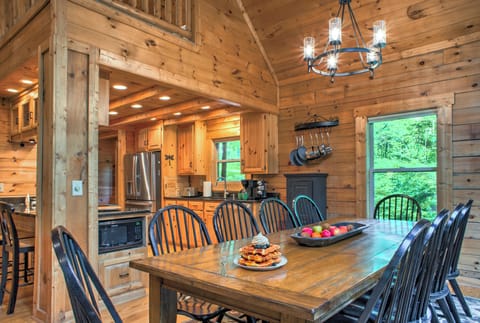 Gather for memorable meals in this elegant dining space
with rustic accents.