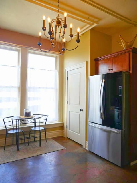 In-unit laundry conveniently tucked behind the door.