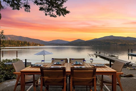 Toast to another perfect day with dinner on the deck—sunsets like this make every moment magic.