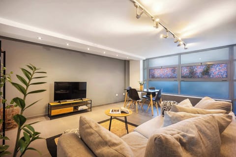 Bright open living area with fast WiFi, perfect for relaxing or catching up online.