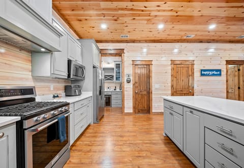 With plenty of space, sleek appliances, and rustic-chic style, this kitchen was made for cooking up memories together.