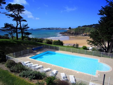 Dive into the spectacular outdoor pool during hot summer days!