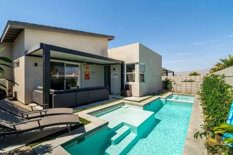 Private heated pool, spa under the stars, and covered patio with lounge for BBQs and dining.