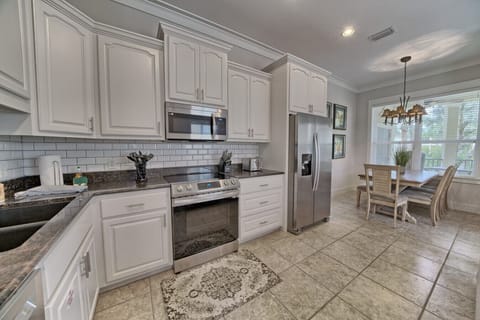 Stainless appliances and charming finishes make cooking feel like a treat