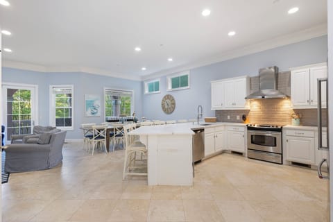 Whip up culinary delights in a fully equipped, modern kitchen featuring top-of-the-line appliances.