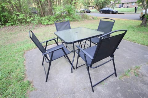Enjoy the fresh air in the outdoor seating area, with extra chairs.