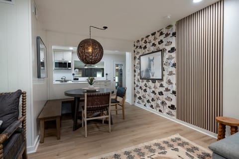 Dining room that is connected to the kitchen and flows to the game room