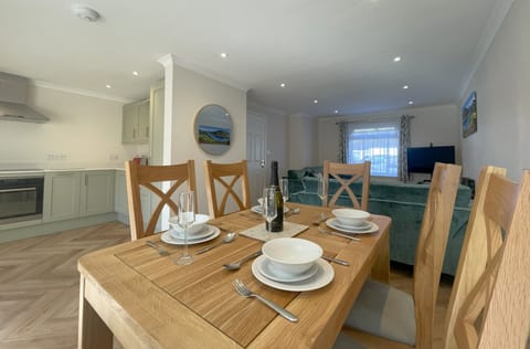 The dining room table can sit 6 comfortably.