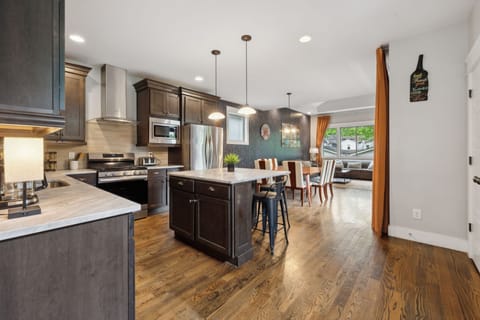 Kitchen: Your gourmet getaway awaits! Enjoy cooking with top-tier stainless steel appliances and ample counter space on beautiful white marble.