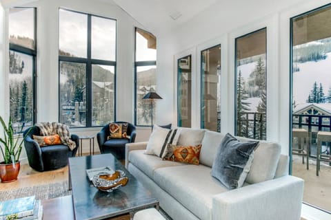 Enjoy the Magnificent Views from this Nicely Appointed Living Room with Sofa, Love Seat, and 2 Club Chairs