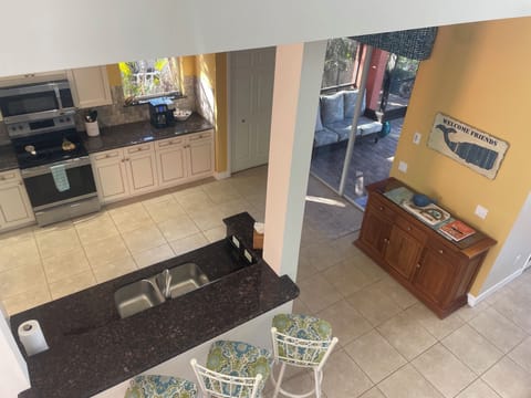 Second floor landing - Looking into the kitchen from the second floor landing on way up to the master suite.