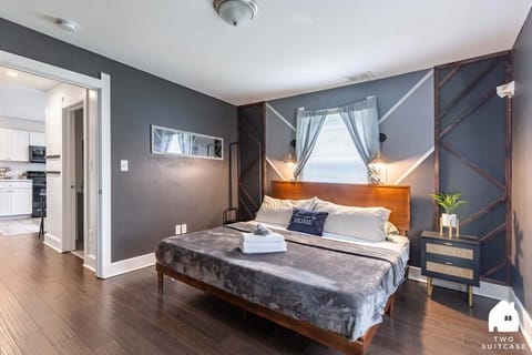 Wake up to soft morning light in this spacious master bedroom with plenty of room to settle in.