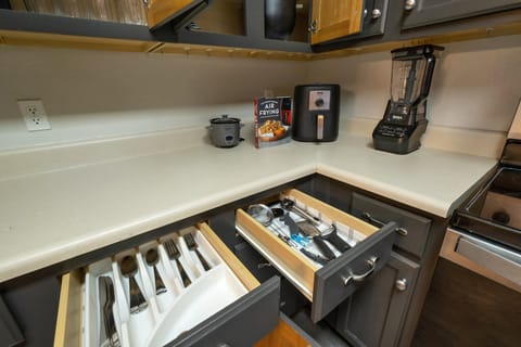 Start your day with fresh smoothies or hot meals—blender, air fryer, and rice cooker included.