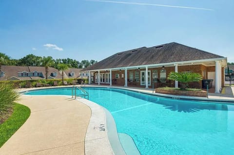 Dive in to the cool waters of the community pool.
