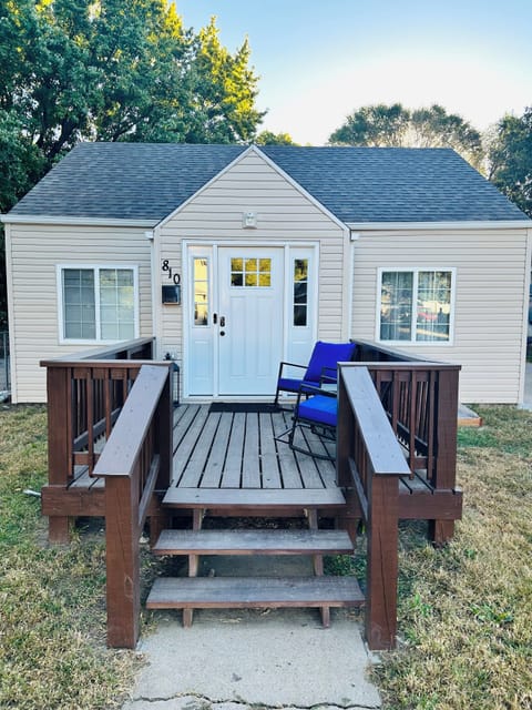 Front house view-seating in front-rocking chairs and table