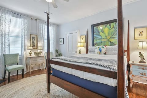 Step into the Songbird Room—a vibrant sanctuary featuring a plush queen bed, beautiful accents, and warm colors that invite you to relax and soar into comfort.