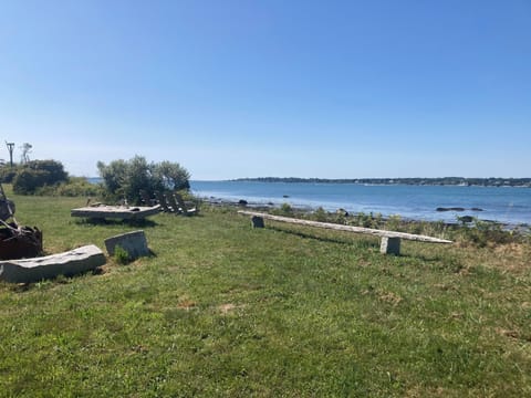 Expansive field overlooking private beach