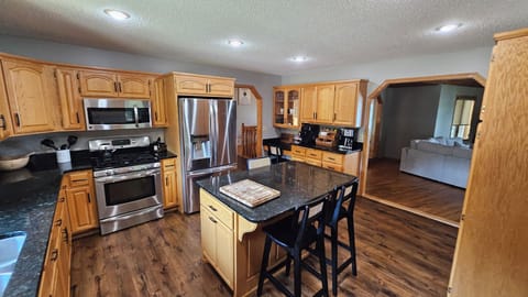 Large kitchen with enough tableware for 20 people. 
