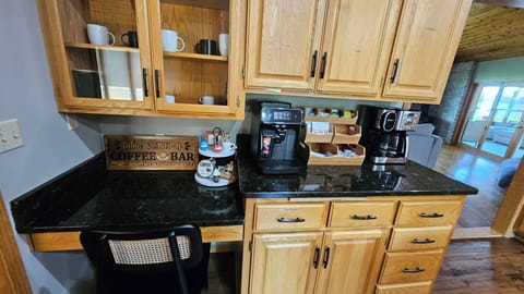 Coffee station with espresso, cappuccino, Keurig, and classic coffee. 