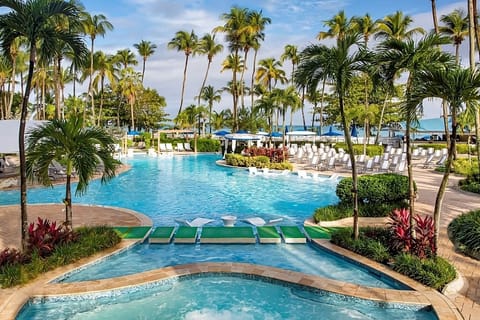 Lounge poolside in a sun-soaked oasis of calm.