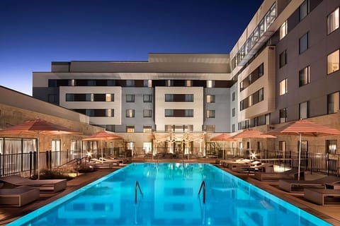 Unwind after dark with a glowing, resort-style pool oasis.