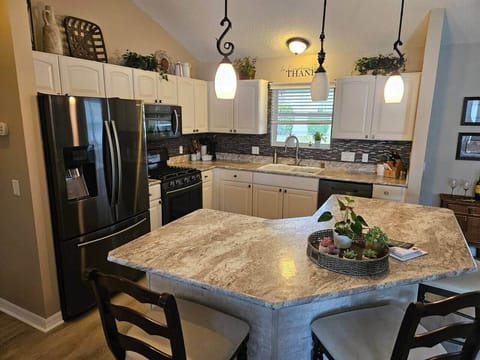 Modern kitchen with newer appliances. 