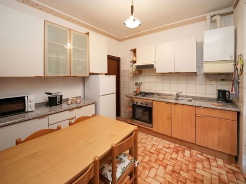 Wood, Flooring, Interior Design, Floor, Kitchen, Furniture, Ceiling, Major Appliance, Countertop, Room