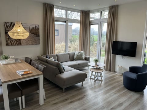 Furniture, Interior Design, Flooring, Floor, Wood, Couch, Living Room, Chair, Home, Ceiling