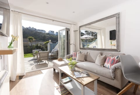 Bluebirds is a charming two-bedroom holiday home perfectly positioned just fifty metres from Polzeath Beach