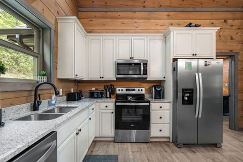 Cook up your favorites in the fully equipped kitchen!