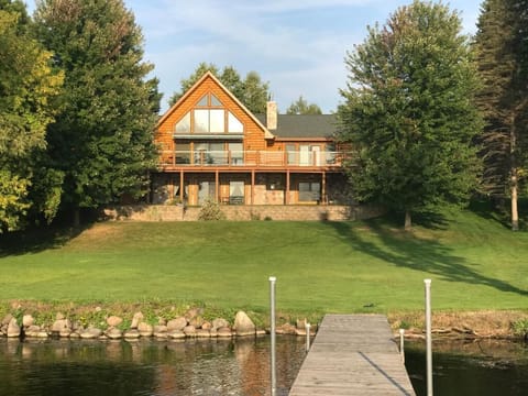 Gorgeous log cabin overlooking Rush Lake. 