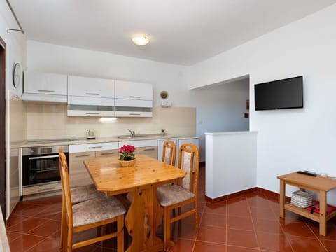 Furniture, Wood, Interior Design, Cabinetry, Kitchen, Flooring, Countertop, Cupboard, Room, Wood Stain