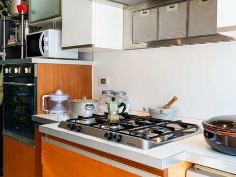 Furniture, Wood, Interior Design, Cabinetry, Kitchen, Flooring, Countertop, Cupboard, Room, Wood Stain