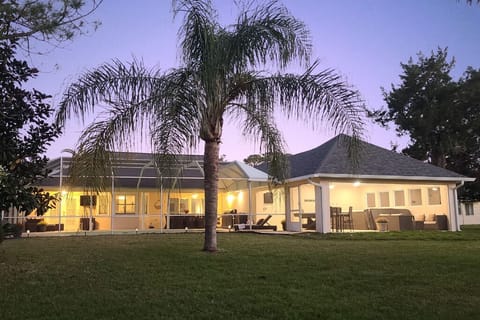 The 1,700 foot lanai and outdoor living area. Well lit and fully screened.