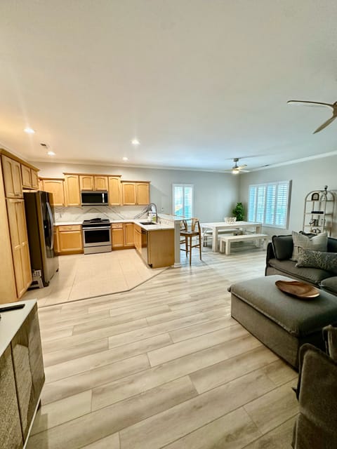 Large main living/dining/kitchen area with new appliances and all new furniture