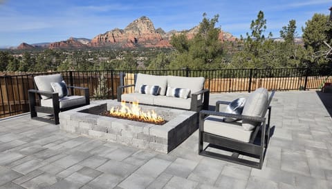 Relax at the firepit with sweeping views of Red Rocks.