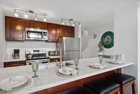 Fully equipped kitchen with modern appliances—perfect for home-cooked meals during your stay.