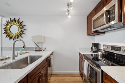 Fully equipped kitchen with modern appliances—perfect for home-cooked meals during your stay.