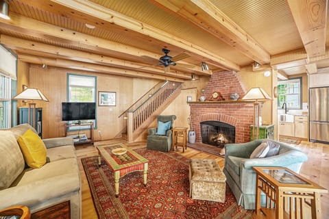 Living room with seasonal fireplace is a wonderful place to gather during any time of year