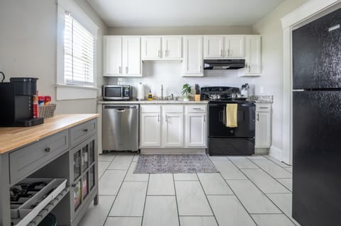 Fully equipped kitchen with modern appliances and ample counter space