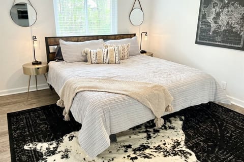 King Beds in every bedroom! Four units, one rental! Come stay with us and enjoy a hotel feel but with the amenities as if you are still at home