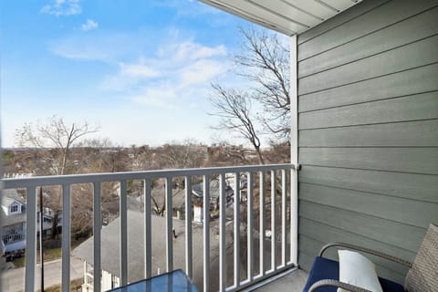Private balcony with seating and scenic views, perfect for relaxing outdoors.