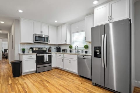 Highlights the functional and stylish kitchen, ready to cater to all your dining needs.