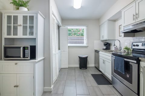 Open kitchen layout with natural light, full-size appliances, and all the basics covered.