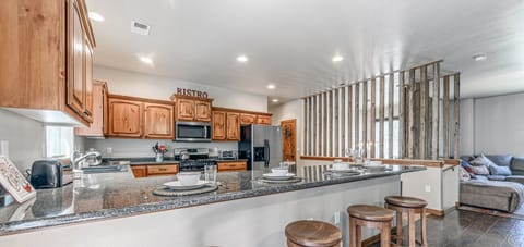 Spacious kitchen with large breakfast bar