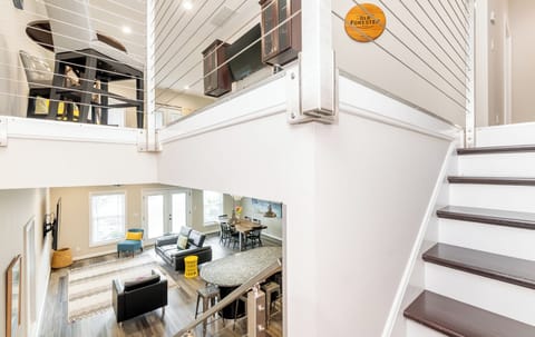 View into first floor entertaining area from stairs