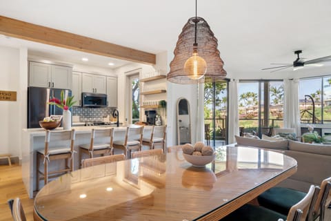 Gather for memorable meals at the spacious dining table, with open concept flow